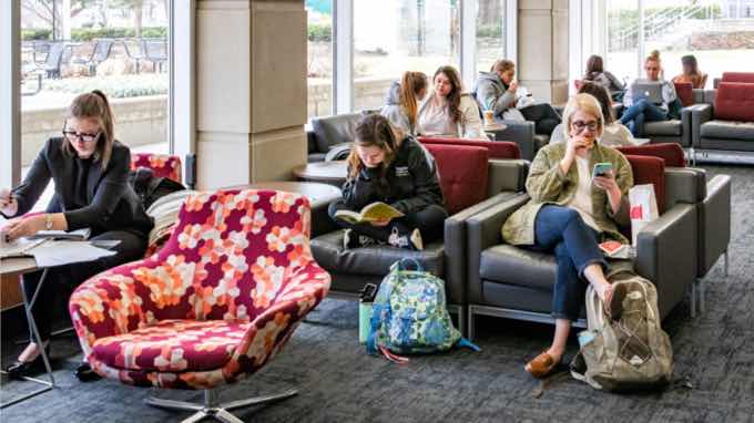 Students studying in a lounge area